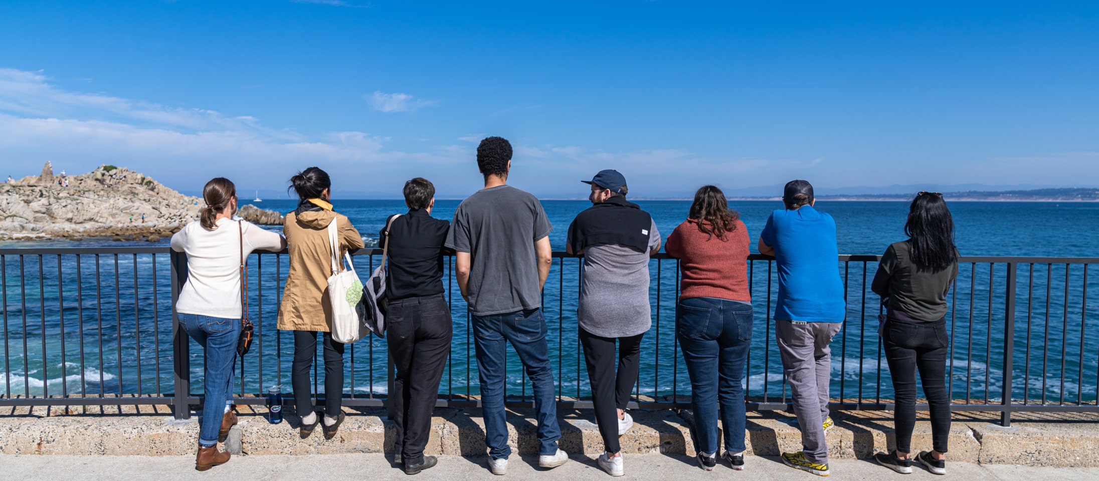A photograph of some Compiler teammates overlooking the Pacific Ocean.